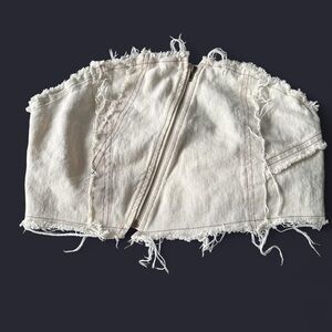 beige cream and white distressed denim crop top with
asymmetrical zipper